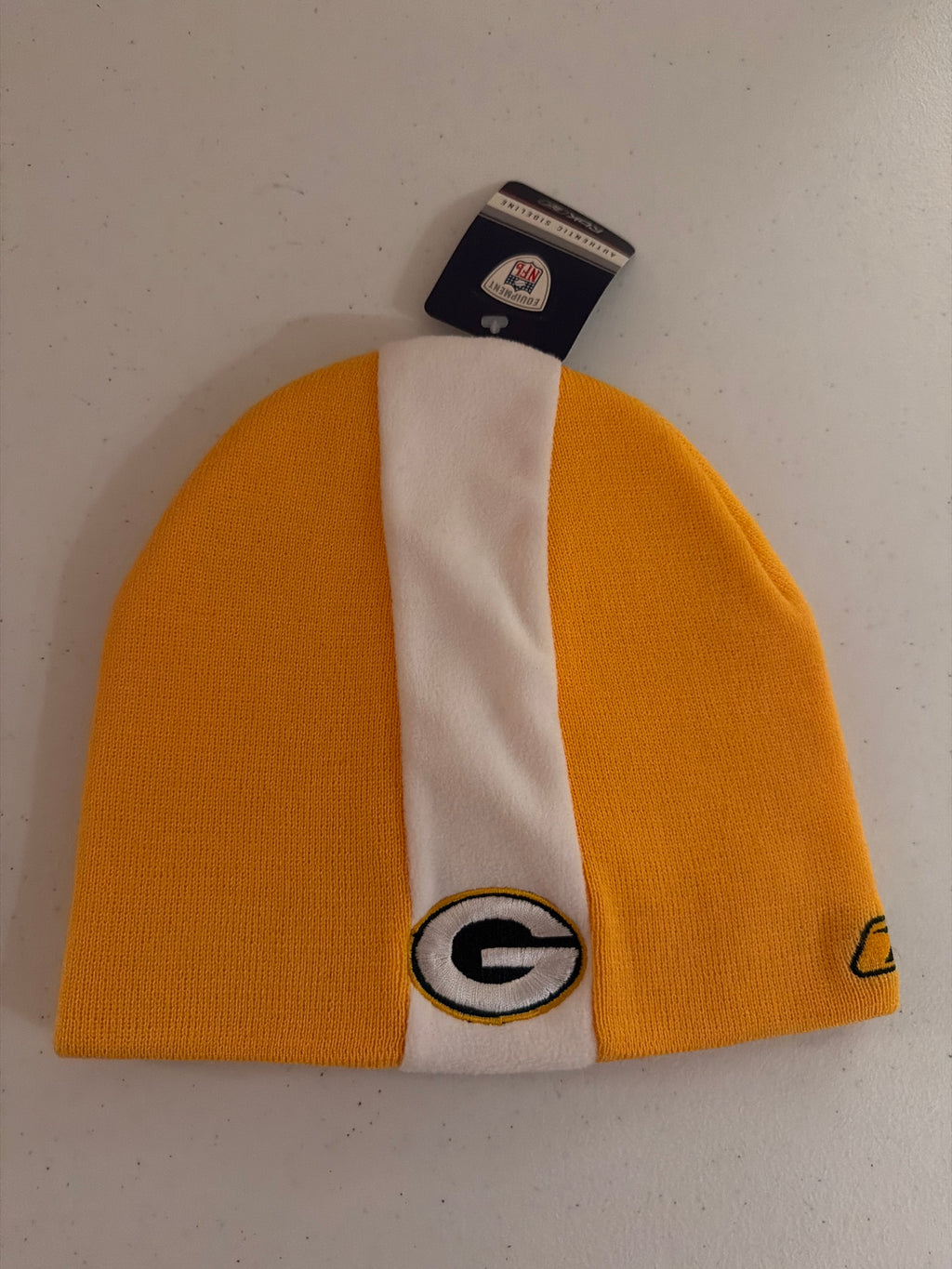Brand new Green Bay Packers beanie front - gold knit with white stripe and G logo