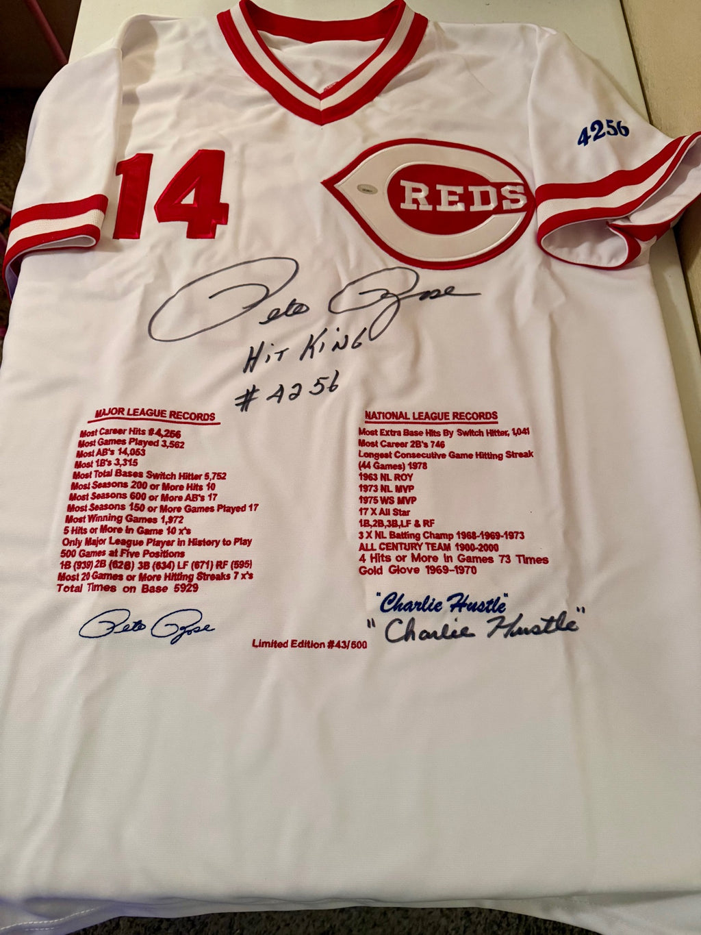Pete Rose autographed Reds jersey front