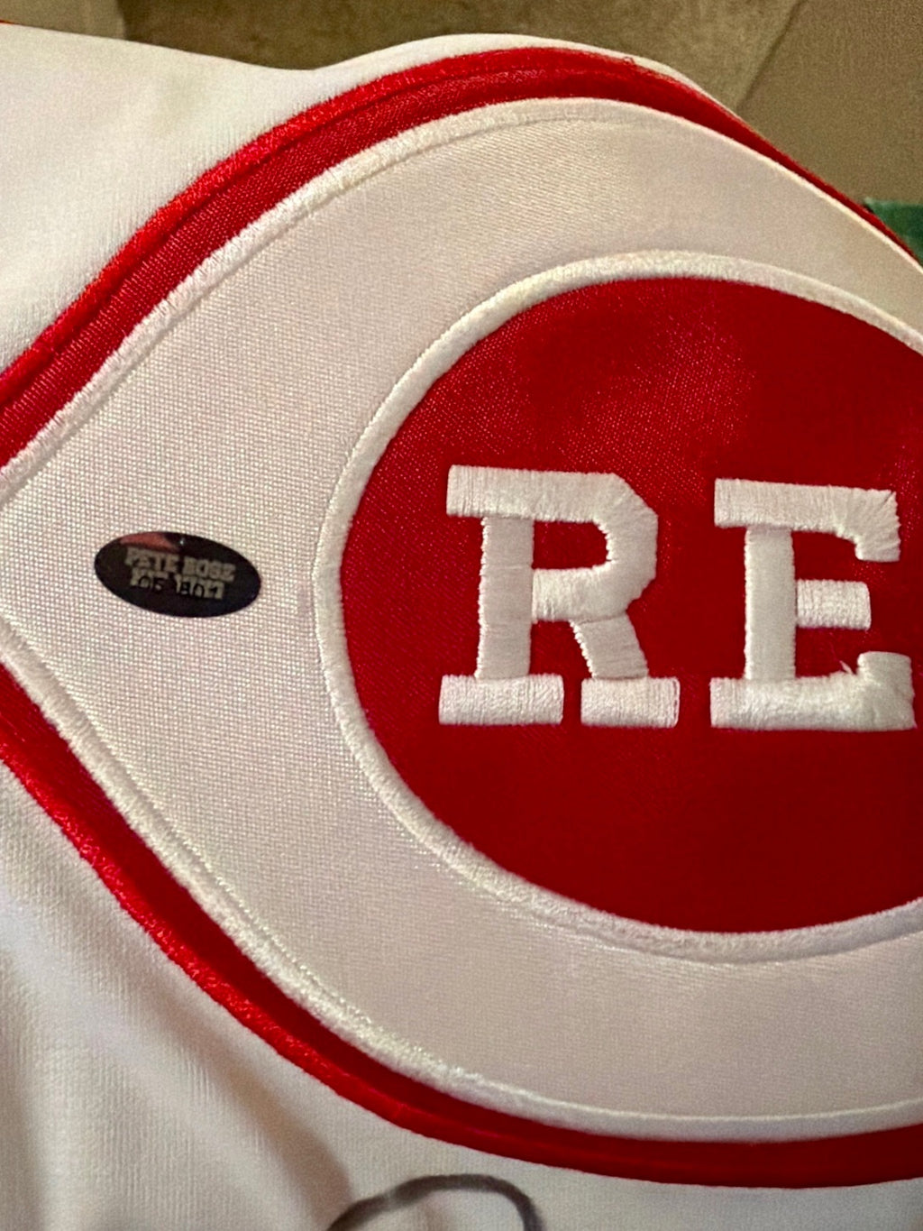 Pete Rose hologram sticker on REDS logo