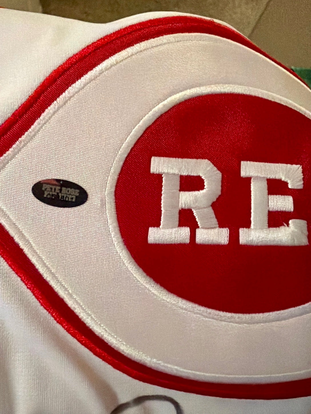 Pete Rose hologram sticker on REDS logo